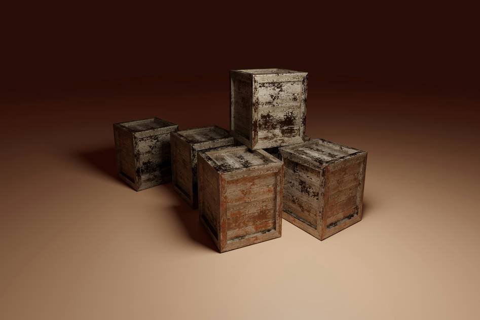 Collection of ornate decorative boxes in neutral tones